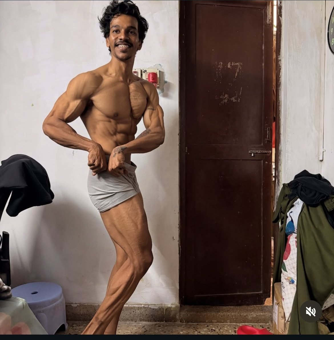 Loki side chest pose showing muscular development
