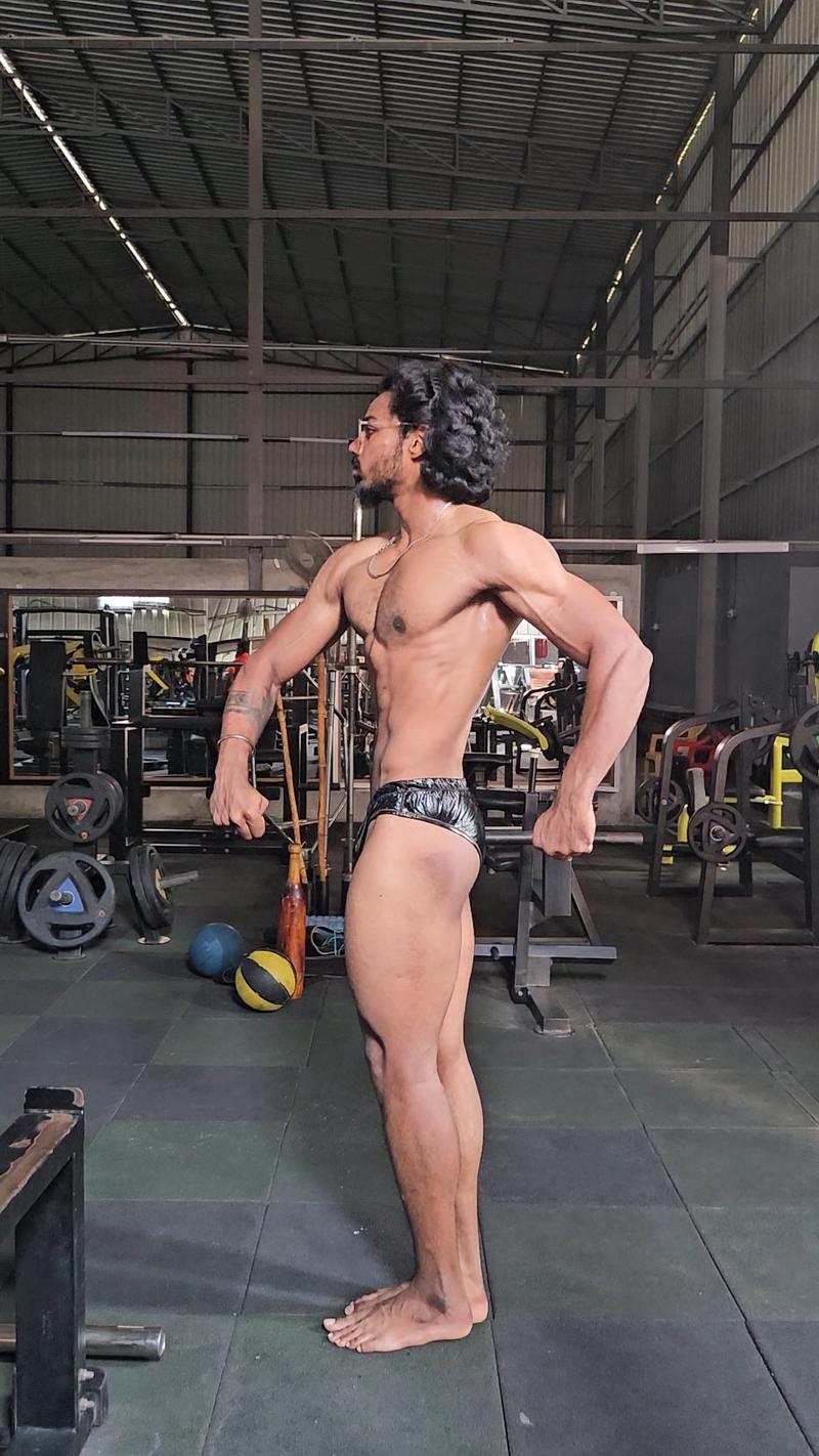 LOKIVERSE competition prep athlete rear lat spread pose ICN India 2026